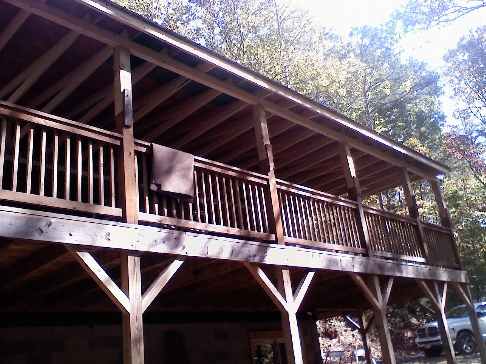 Timber framing under a new elevated porch and deck — Roof Leak Repair in Slate Run by Roofing Brothers